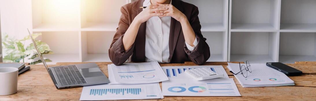 close-up-bookkeepers-working-with-balance-sheet-to-analyze-problems-and-find-solutions-to-bringing-develop-business-organization-and-company-s-stock-market-system-common-stock-and-preferred-stock-photo